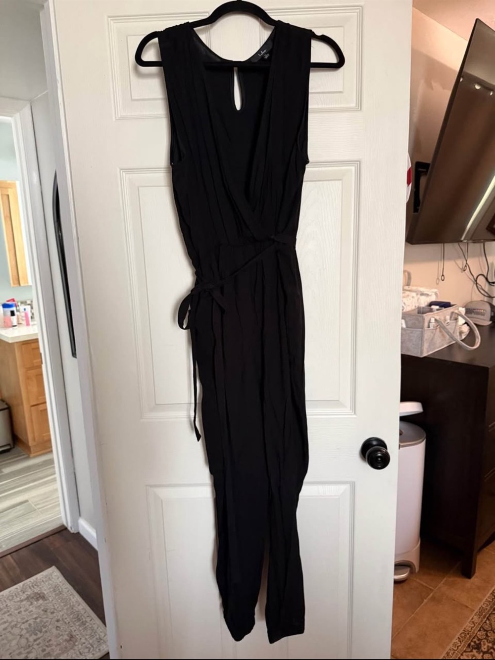 Lulu's Black Sleeveless Wrap-Style Jumpsuit